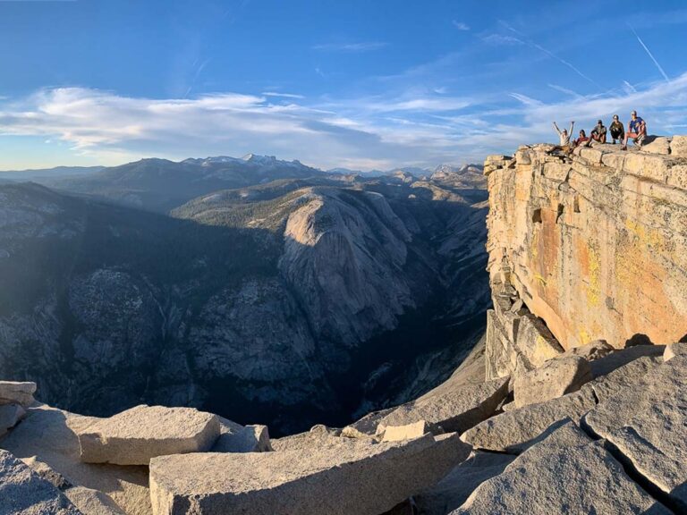 Soaking in the view from the summit on one of our Half Dome Backpacking trips