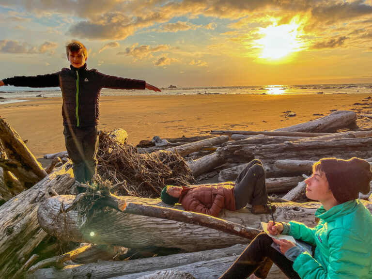 Kids enjoying the sunset on the beach