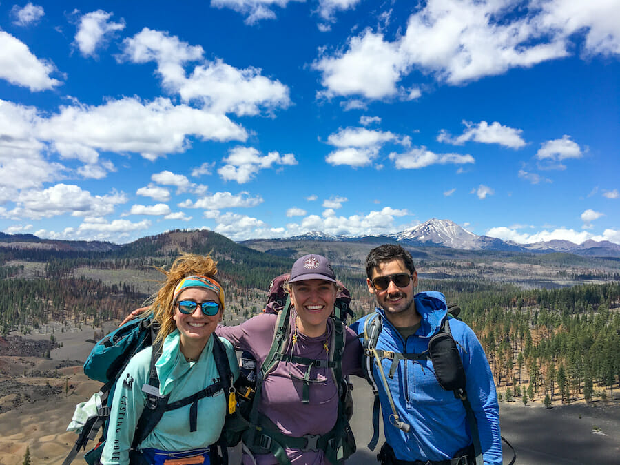 Guides posing in front of the grand scenery in Lassen.