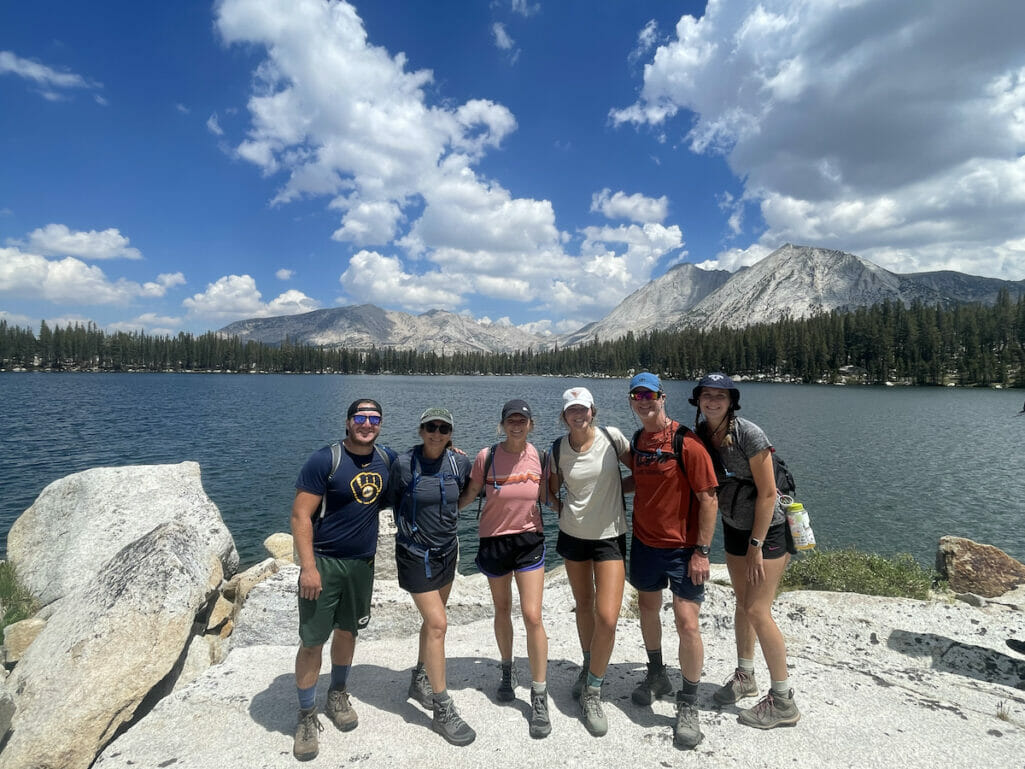 Family poses in front of Lower Young Lake in Yosemite.