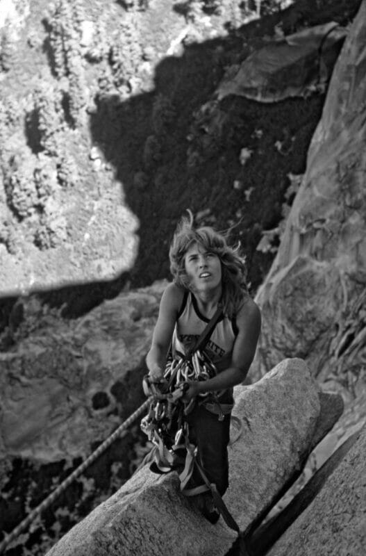 Lynn Hill looking up while climbing Half Dome.