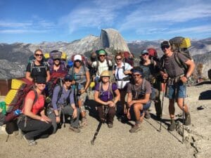 Backpacking group shot in front of Half Dome