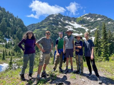 A group of teens backpacking in Olympic National Park