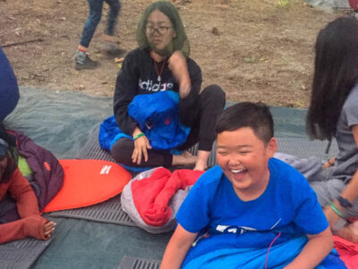 Smiling and relaxing during our outdoor summer camp for kids in Yosemite