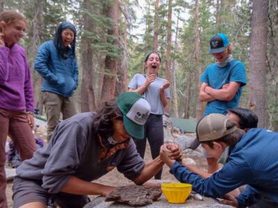 Arm wrestling during one of our Yosemite backpacking summer camps