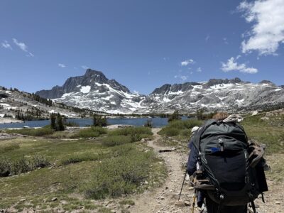 Teen backpacking toward Mt Banner