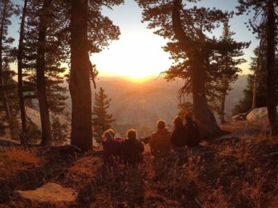 outdoor summer participants enjoy the sunset in Yosemite