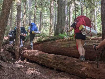 Hiking in Olympic National Park on a young women summer camp trip