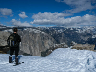 Checking out the view on a Yosemite snowshoeing adventure
