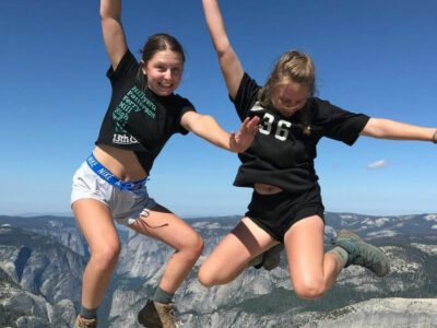 campers jump for joy during one of our summer camps in Yosemite
